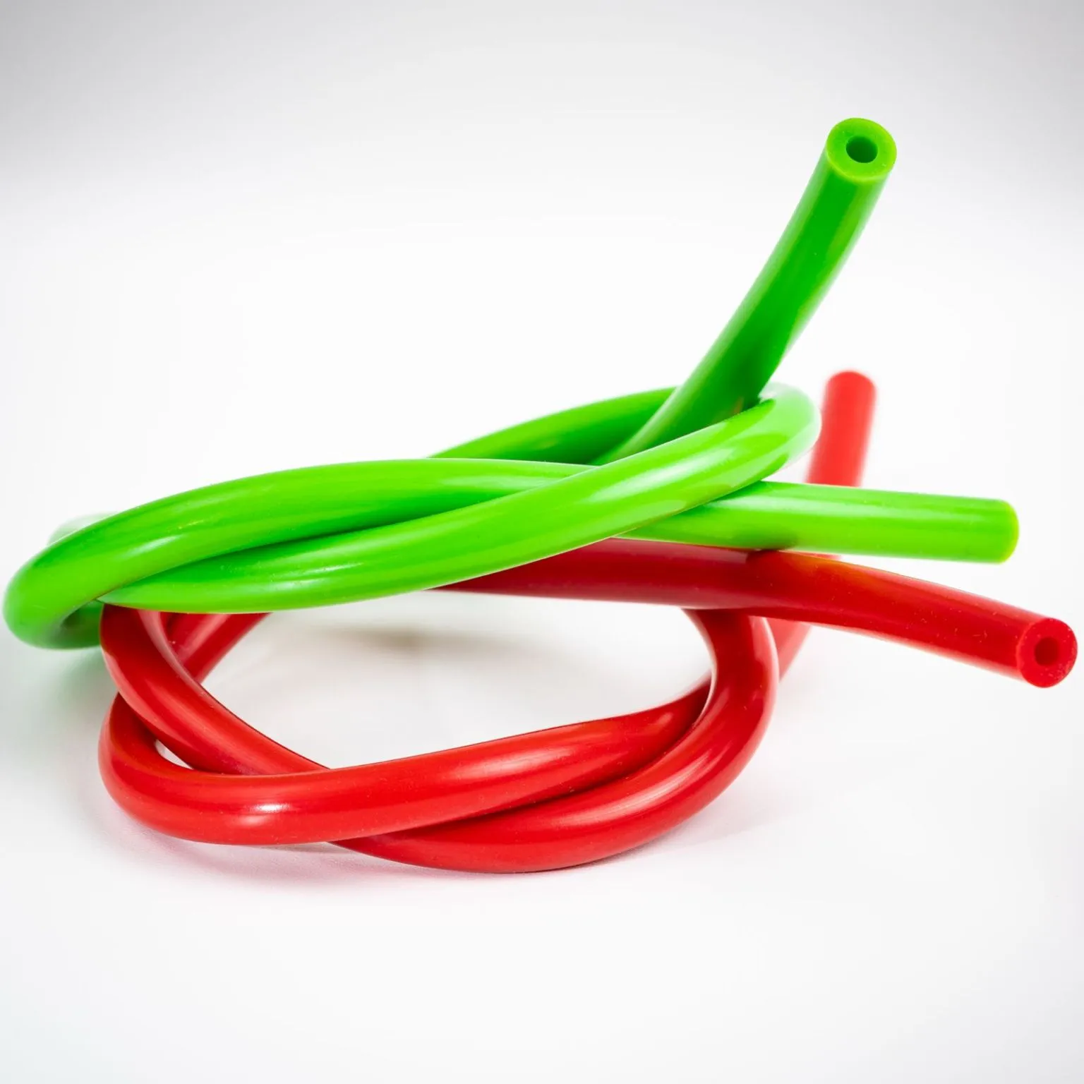 Co-extruded bicolour or multi-material tube