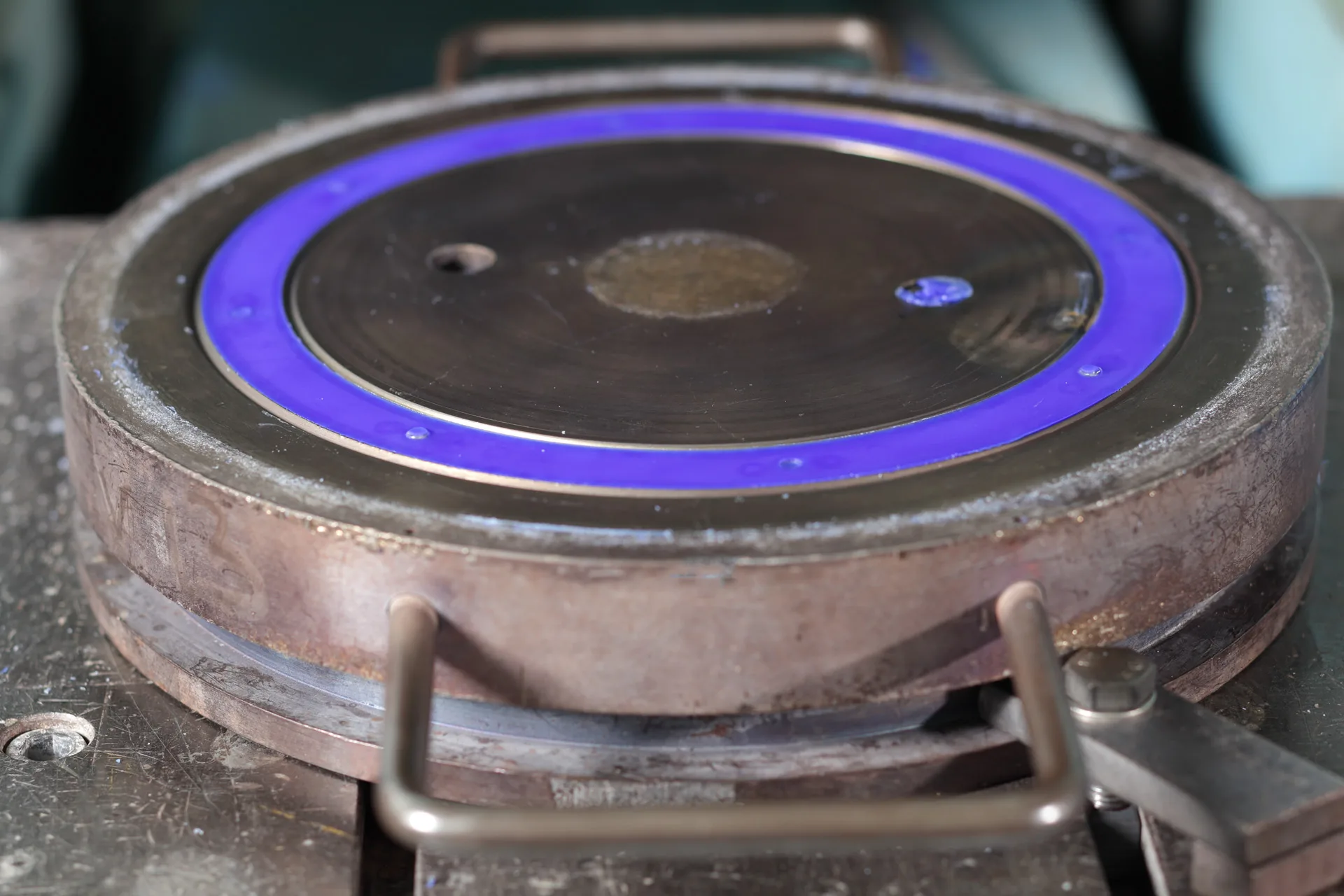 Compression mould just opened · purple seal vulcanised on a machined cavity